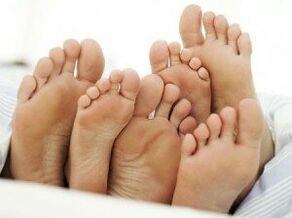 Healthy feet after toe fungus treatment.